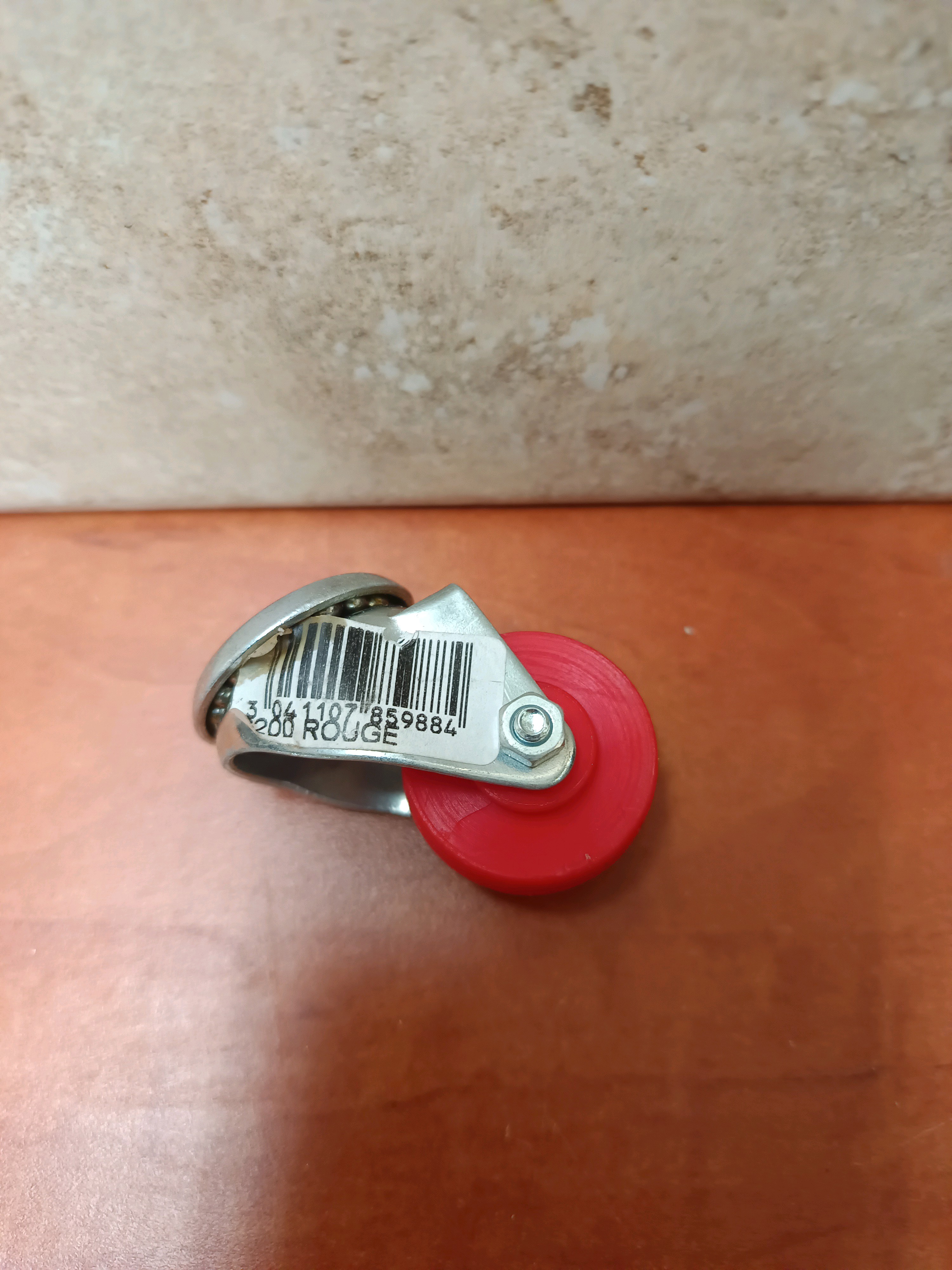 Roulette pivotante rouge avec chape métallique