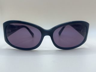 Lunettes de soleil cat-eye, monture noire, verres violets