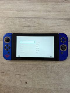 Nintendo Switch (console) avec manettes bleues thème Zelda (tiers)