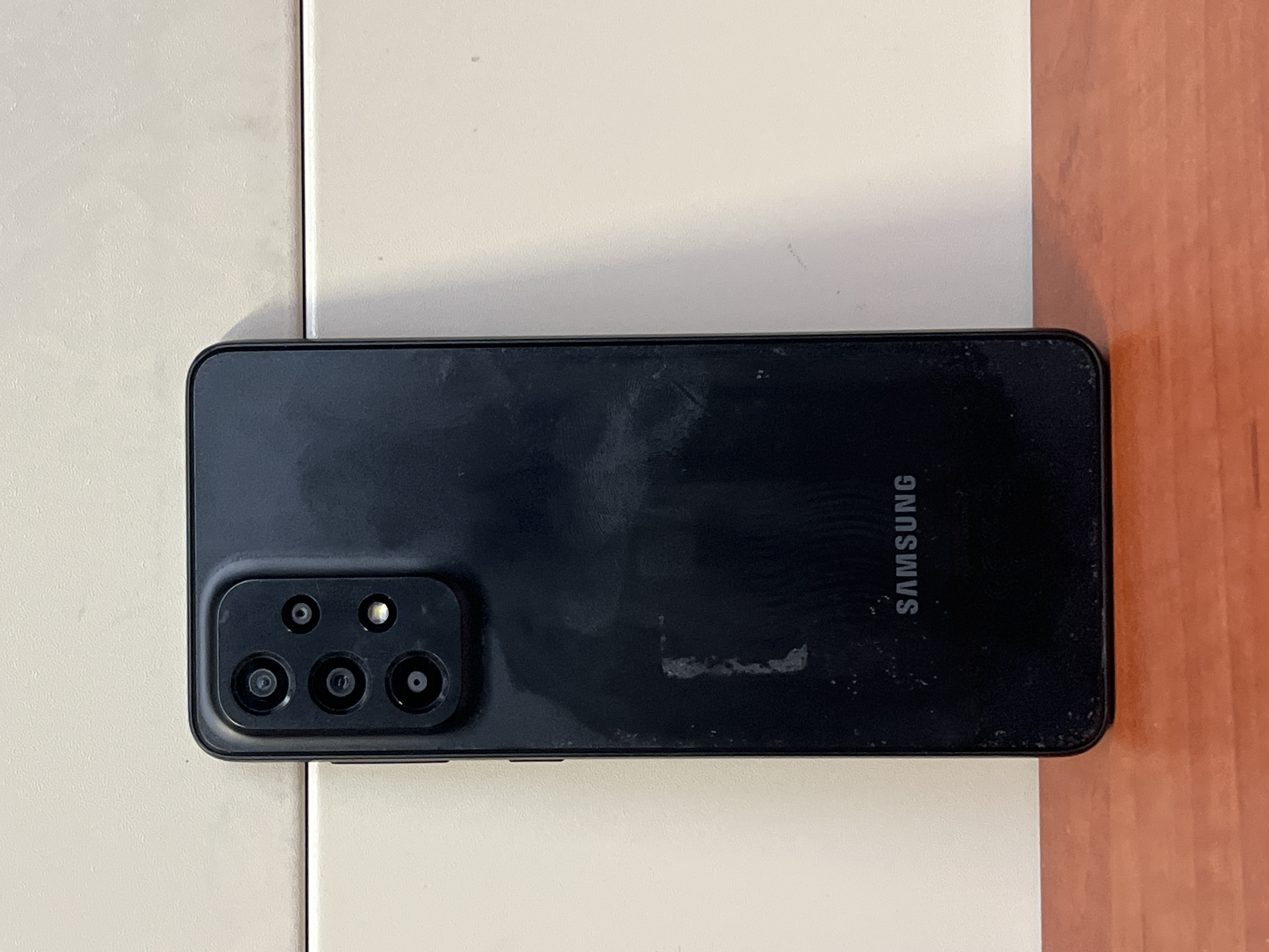 Smartphone Samsung noir (défectueux)