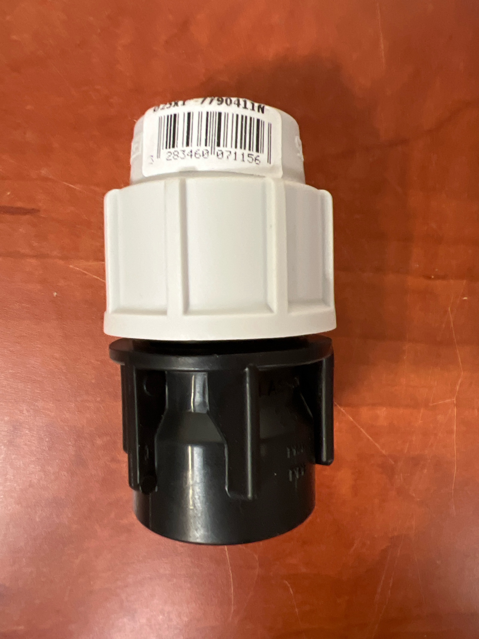 Raccord de compression pour tube PEHD (écrou blanc, corps noir)