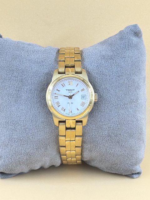 Montre Tissot PR 50 femme dorée bracelet acier cadran blanc chiffres romains