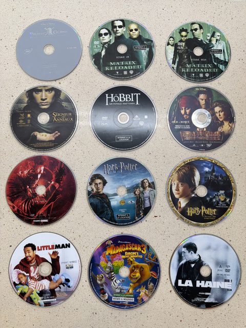 Lot de 12 DVD films : Harry Potter, Matrix, Pirates des Caraïbes et autres