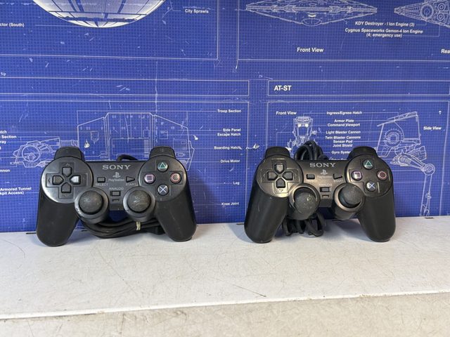 Lot de 2 manettes Sony PS2 pour pièces