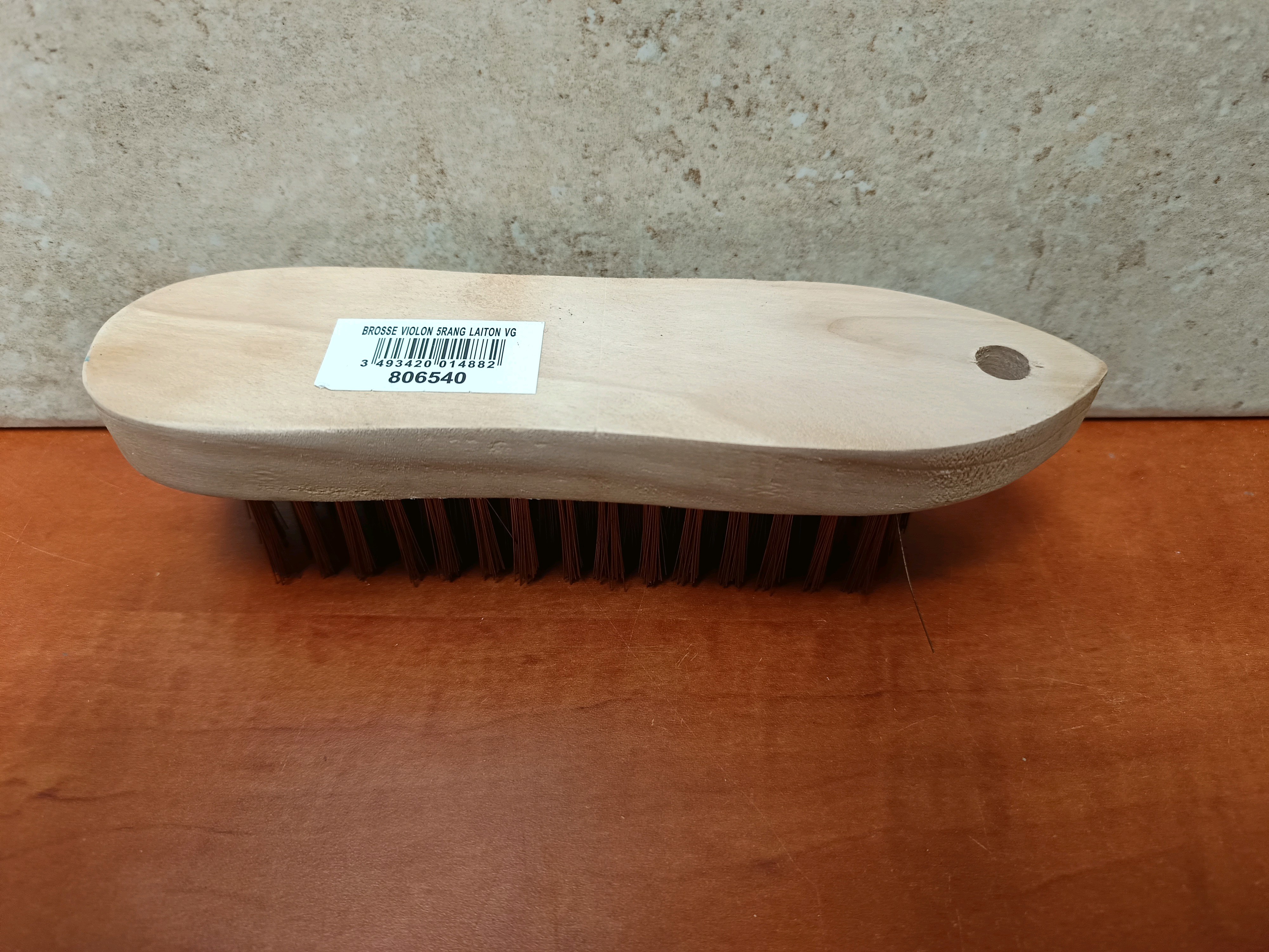 Brosse métallique manuelle à manche en bois