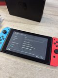 Console Nintendo Switch Joy-Con bleu néon rouge néon — photo 3