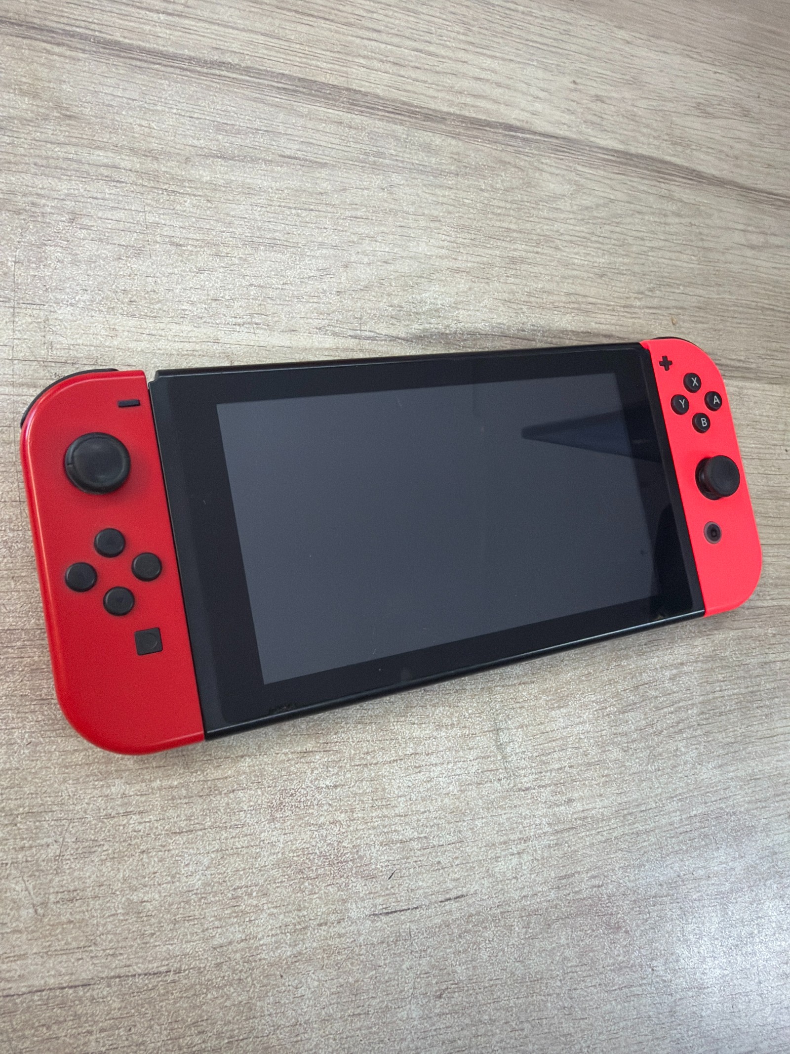 Nintendo Switch (Joy-Con rouges) complète sans boîte — photo 2
