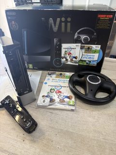 Console Nintendo Wii noire pack Mario Kart 25e anniversaire