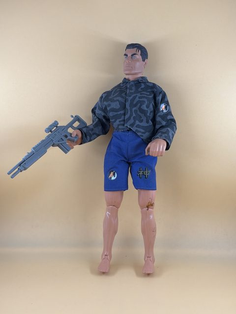 Figurine Action Man articulée avec tenue camouflage