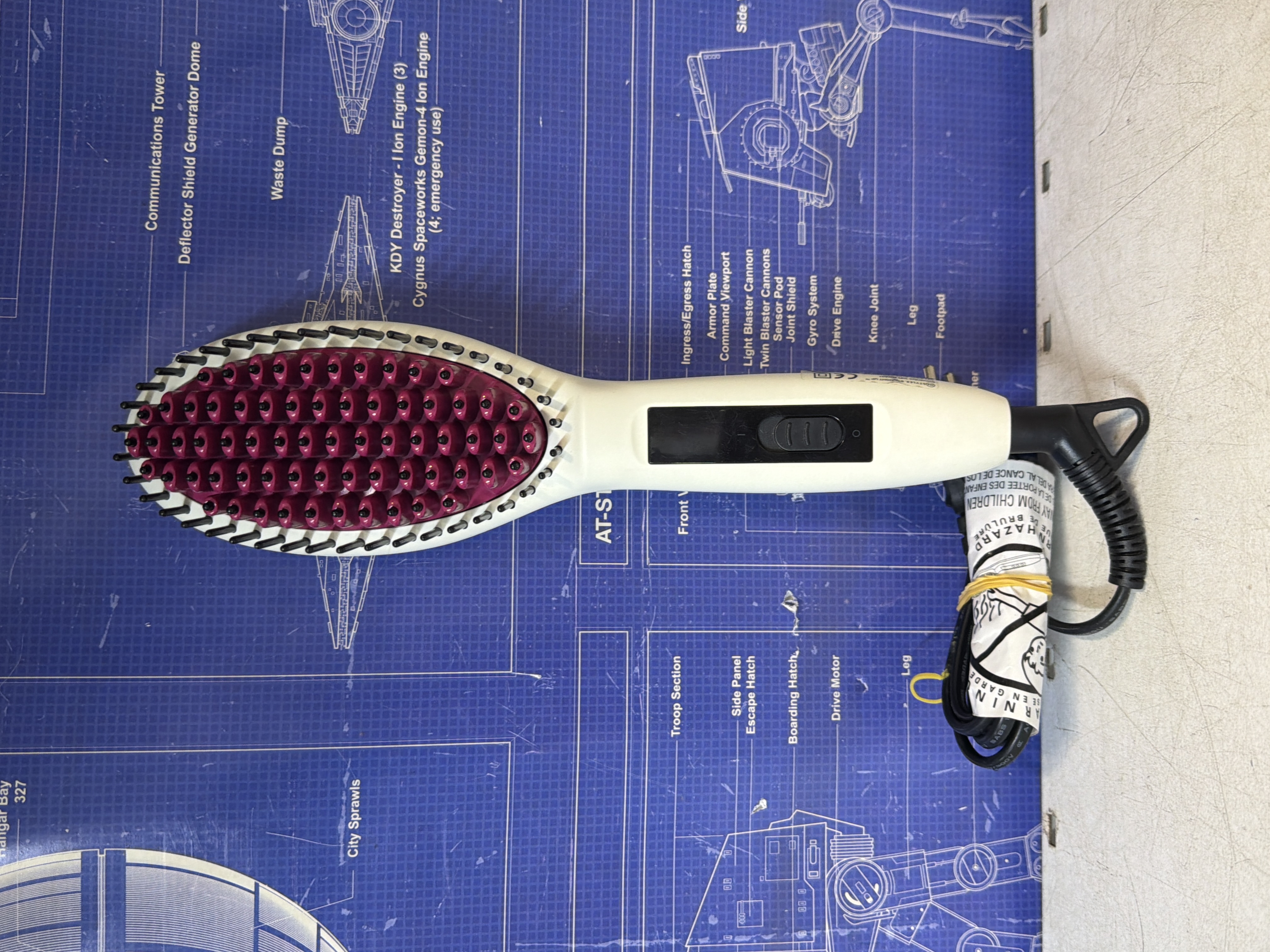Brosse chauffante lissante pour cheveux