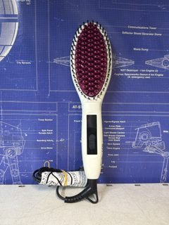 Brosse chauffante lissante pour cheveux