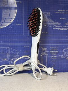Brosse lissante chauffante électrique
