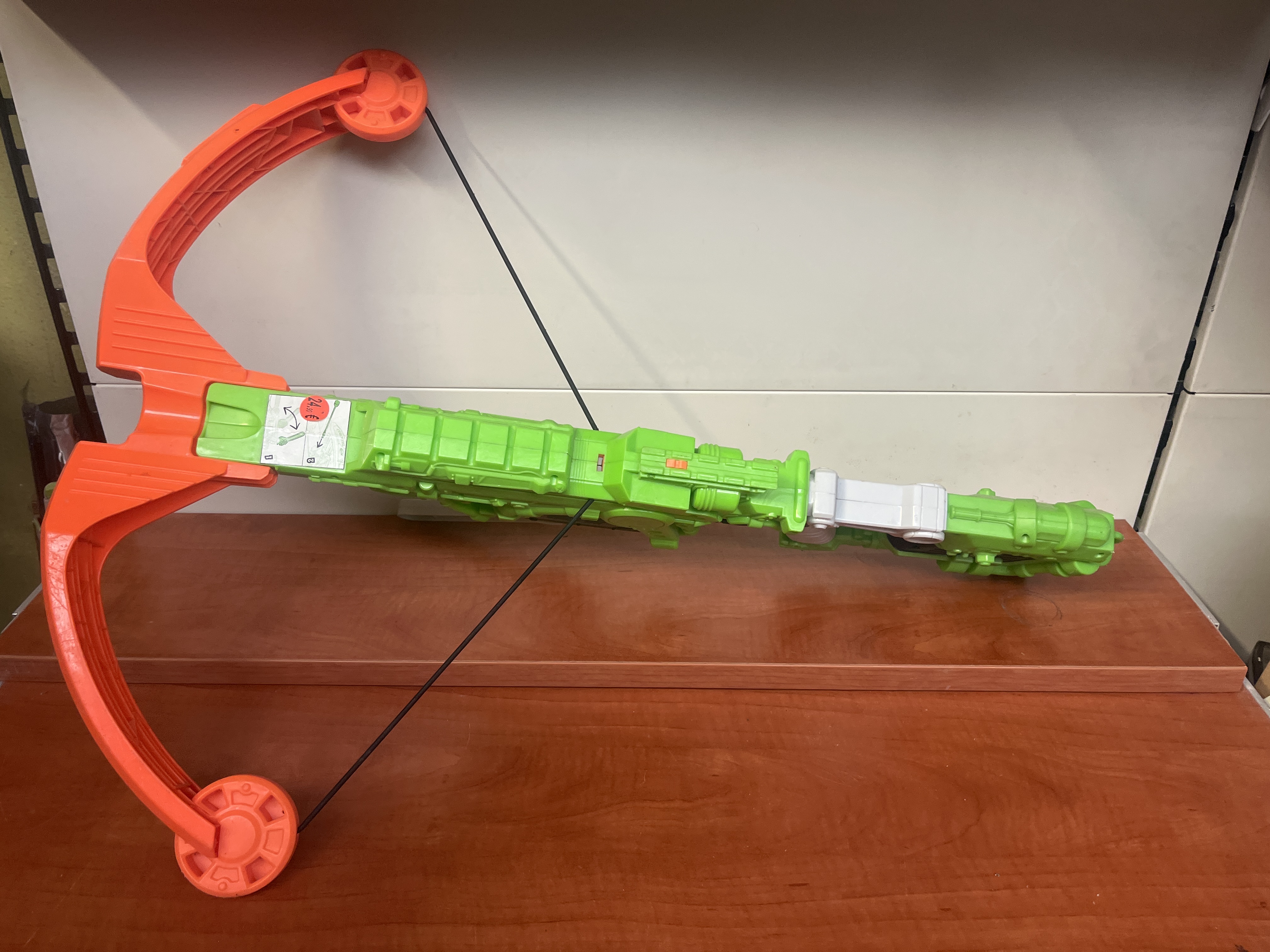 Arbalète jouet à fléchettes en mousse (vert/orange)