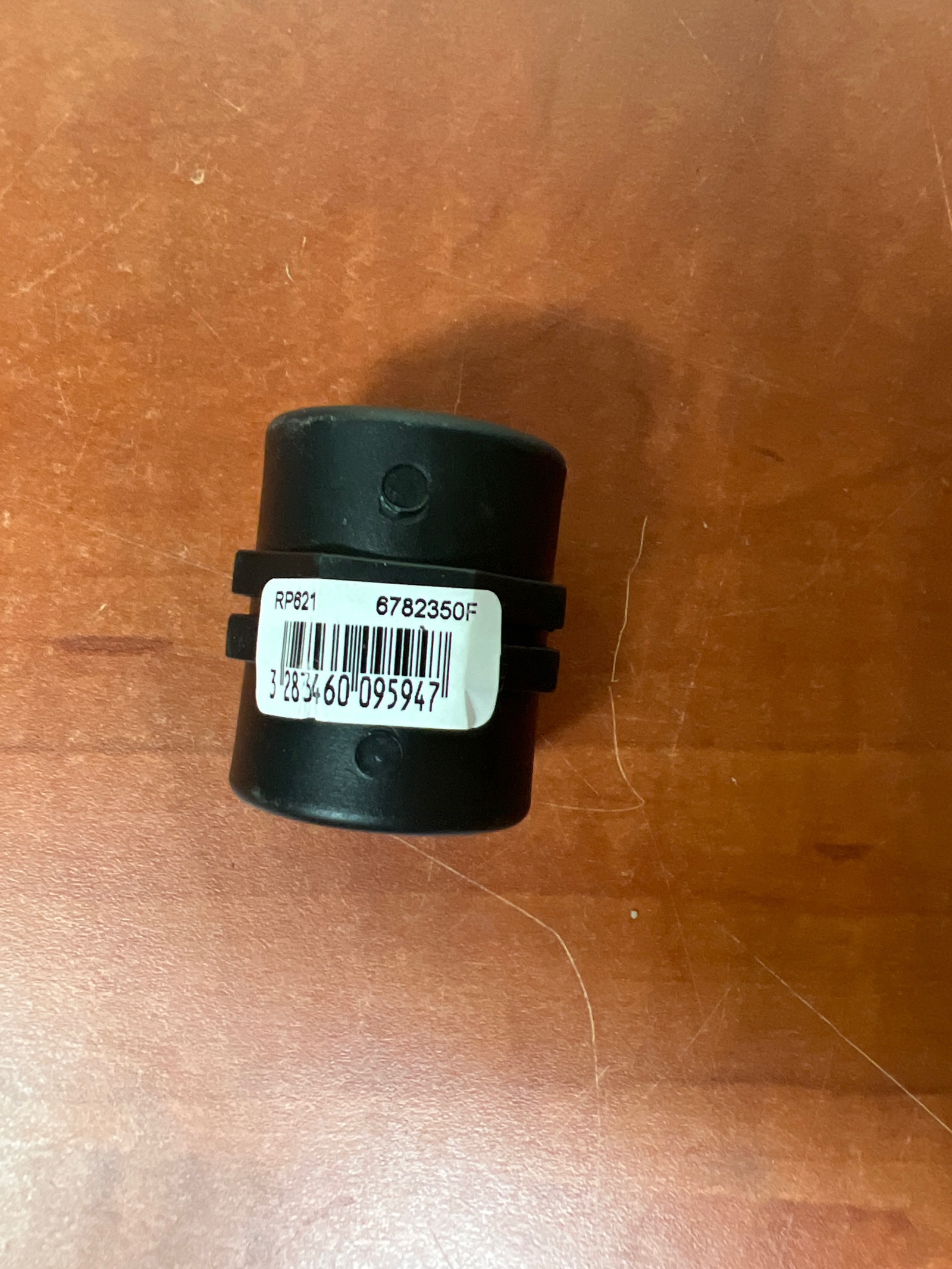 Composant plastique cylindrique noir 6782350F